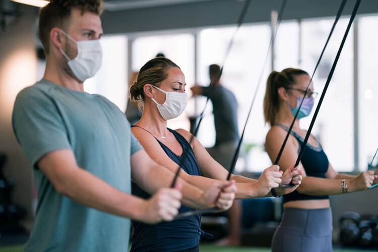 Group of people during training with elastic band